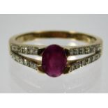 A 9ct gold diamond & ruby ring 2.8g size P/Q