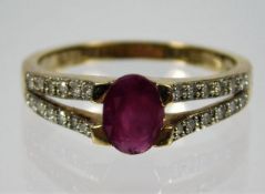 A 9ct gold diamond & ruby ring 2.8g size P/Q