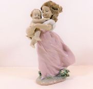 A Lladro figurine of girl with baby pattern no. 66