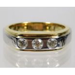 An 18ct two colour gold ring set with approx. 0.45