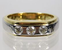 An 18ct two colour gold ring set with approx. 0.45