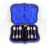 A cased set of Isaac Ellis & Sons silver spoons wi