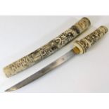 A Meiji period Japanese carved ivory tanto 18in lo