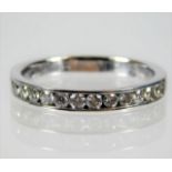 A 9ct gold half eternity ring set with approx. 0.6ct diamond size O 2.7g