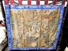 An 18thC. French tapestry featuring knights, drago