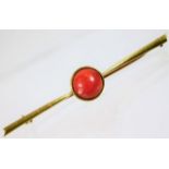 A 19thC. 15ct gold bar brooch set with coral 7.1g