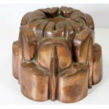 A Victorian copper jelly mould 4.375in high