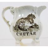A small 19thC. porcelain cream jug with "Chetah &