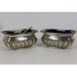 A pair of blue glass lined silver salts with gadro