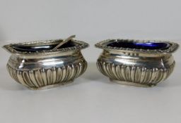 A pair of blue glass lined silver salts with gadro