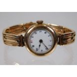 A 9ct gold ladies wrist watch 26g inc.