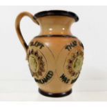 A Doulton stoneware motto jug 4.5in high