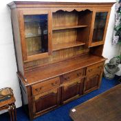 A large cherry wood dresser with three drawers & c