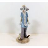 A Lladro clown figurine with bird pattern no. 6916