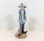 A Lladro clown figurine with bird pattern no. 6916