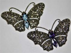 A pair of silver & marcasite butterfly brooches 19