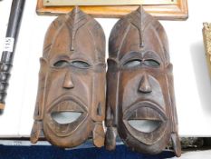 A pair of African hardwood masks