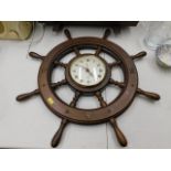 A decorative ships wheel clock