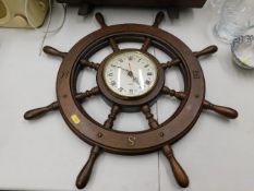 A decorative ships wheel clock