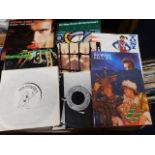 Three boxes of 1980's singles & a quantity of Juke