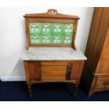 A c.1900 satinwood washstand with marble top & til