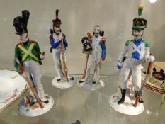 Four Naples porcelain soldier figures approx. 7.75