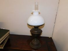 A brass oil lamp & shade