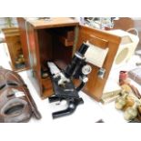 A mahogany cased Hawksley microscope