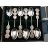 A set of six Chinese white metal spoons twinned wi