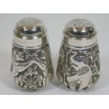 A pair of Asian salt & pepper pot with elephant &