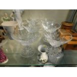 Six cut glass champagne glasses, one cracked