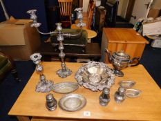 A 19thC. silver plated candelabra & other silver plated wares A/F twinned with four decanters A/F