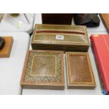 Three decorative inlaid Islamic boxes