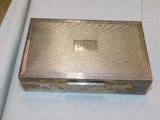 An inscribed silver tobacco box presented to Wilfrid L. Broad by the Justices on his retirement 1967