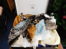 A selection of silk scarves & other items in a Boo