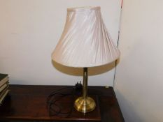 A modern brass lamp & shade