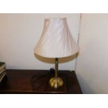 A modern brass lamp & shade