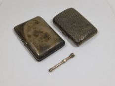 Two silver cigarette cases winned with a white met