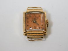 A small 18ct gold cased watch a/f
