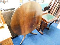 A 19thC. title top mahogany breakfast table