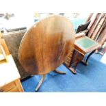 A 19thC. title top mahogany breakfast table