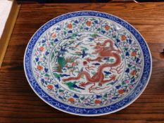 A well decorated Chinese porcelain charger with dr