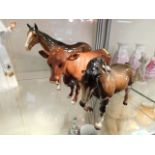 A Beswick pony, foot raised, a Beswick horse, repa