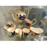 A 1930's art deco eleven piece coffee set by Dora