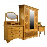 Matched Edwardian satin walnut three piece bedroom suite comprising: wardrobe fitted bevelled mirror