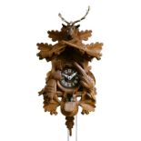 Late 20th Century Black Forest style carved cased cuckoo clock Condition: