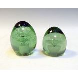 Two 19th Century Nailsea type glass dumps, each having internal floral decoration Condition: