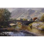 Paul Harley - Oil on canvas - A lake District landscape with stone bridge over a river, signed and