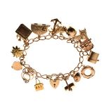 9ct gold and yellow metal charm bracelet, 46.9g approx gross Condition: