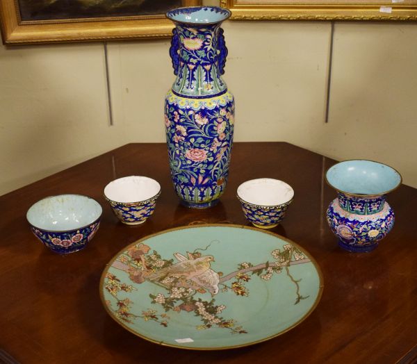 Chinese floral patterned enamel baluster shaped vase, three similar bowls and a Japanese cloisonné